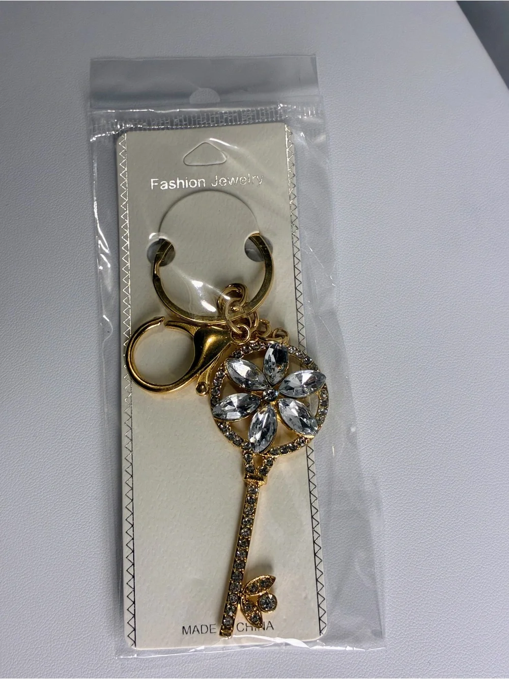 Gold Key Charm with Clear Crystal White Flower Petals New Without Tags